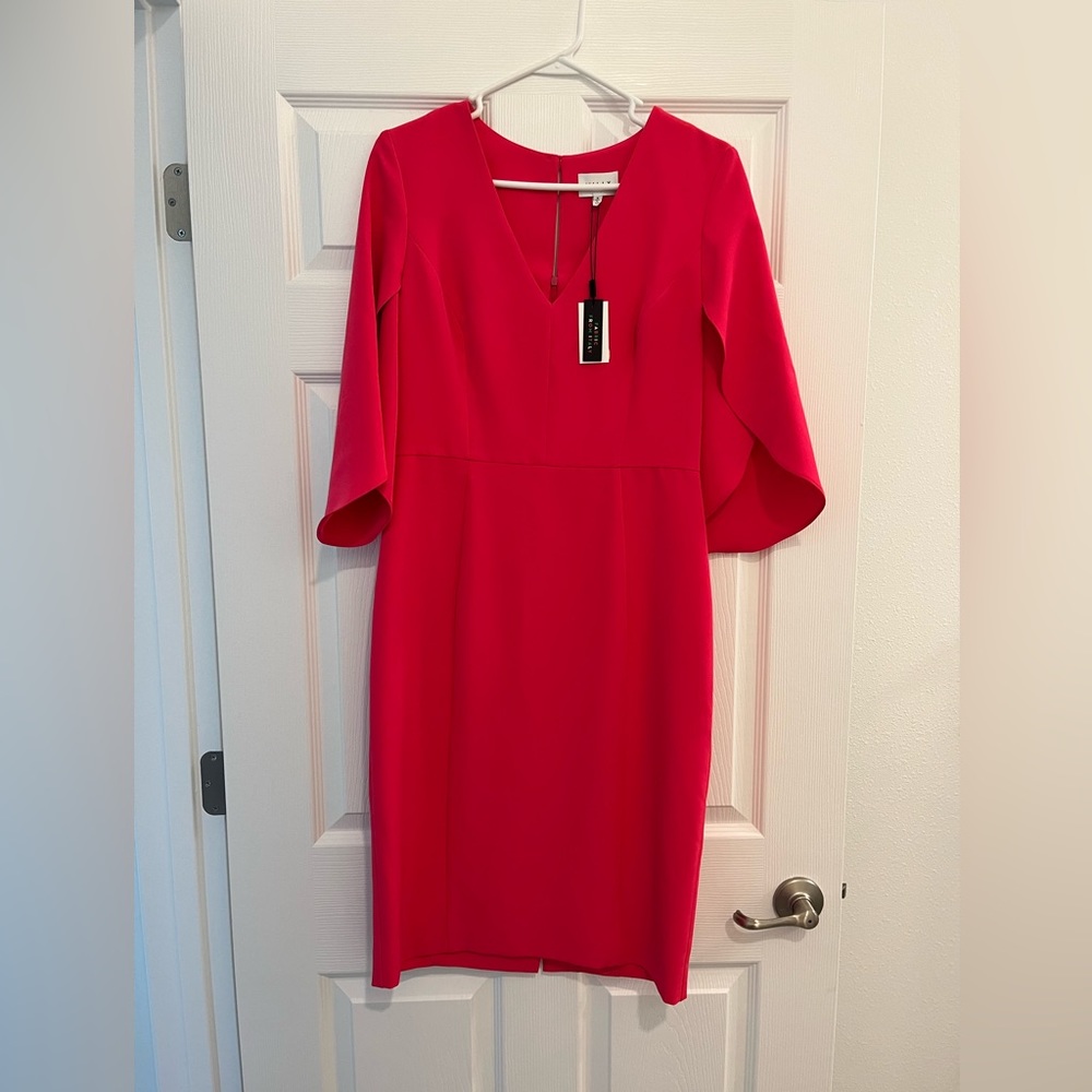 Milly dress size 8, brand new, up to knees. Stretchy material.